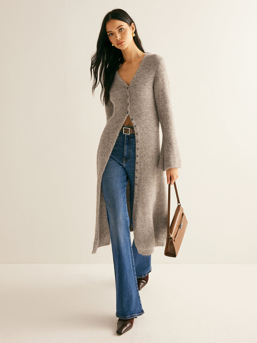 Women's long V-neck button front knit cardigan with flared cuffs