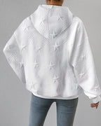 White textured hoodie with raised star pattern