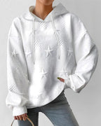 White textured hoodie with raised star pattern