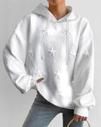 White textured hoodie with raised star pattern