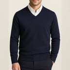 Men's long-sleeve V-neck sweater with ribbed trims worn over a collared shirt
