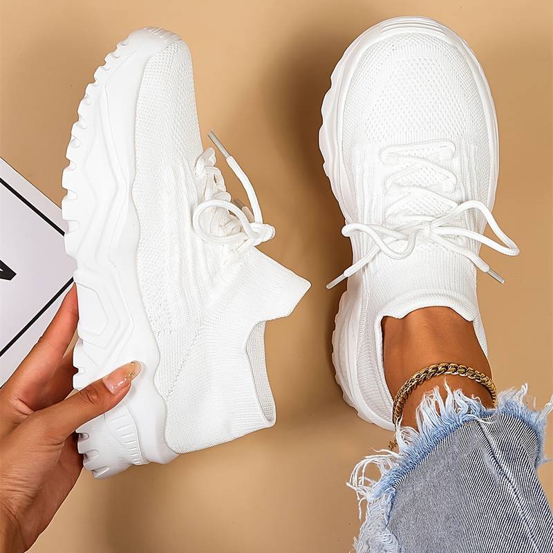 Women's orthopedic knit sneakers with lace-up front and ridged sole