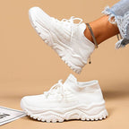 Women's orthopedic knit sneakers with lace-up front and ridged sole