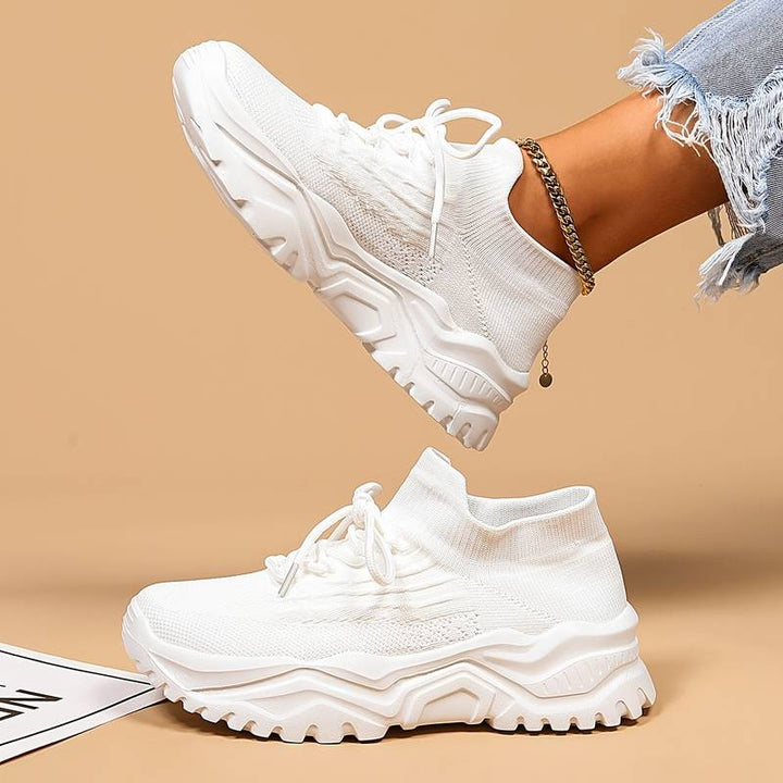 Women's orthopedic knit sneakers with lace-up front and ridged sole