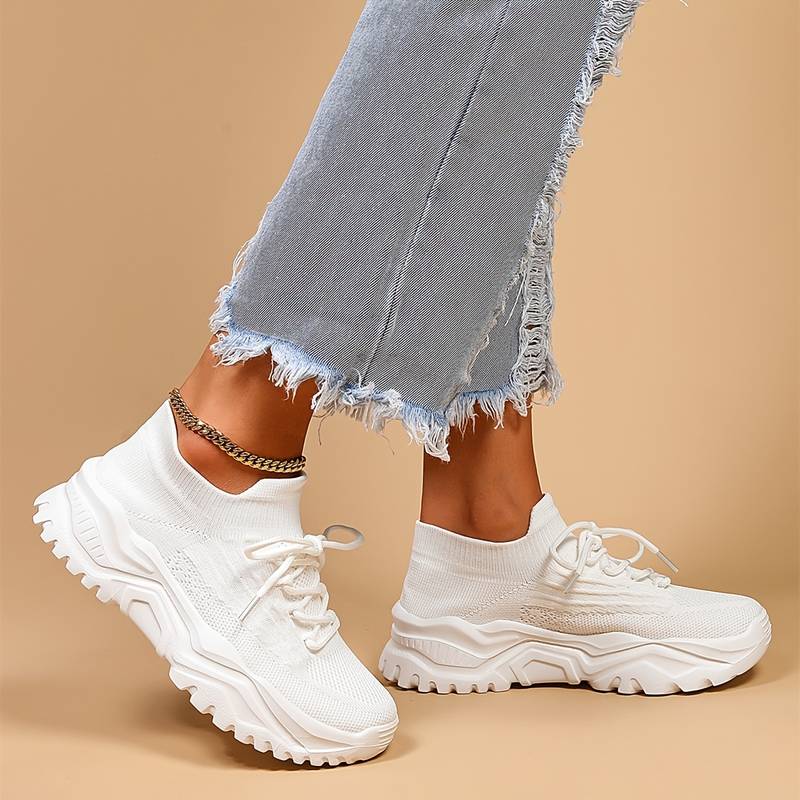 Women's orthopedic knit sneakers with lace-up front and ridged sole