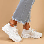 Women's orthopedic knit sneakers with lace-up front and ridged sole