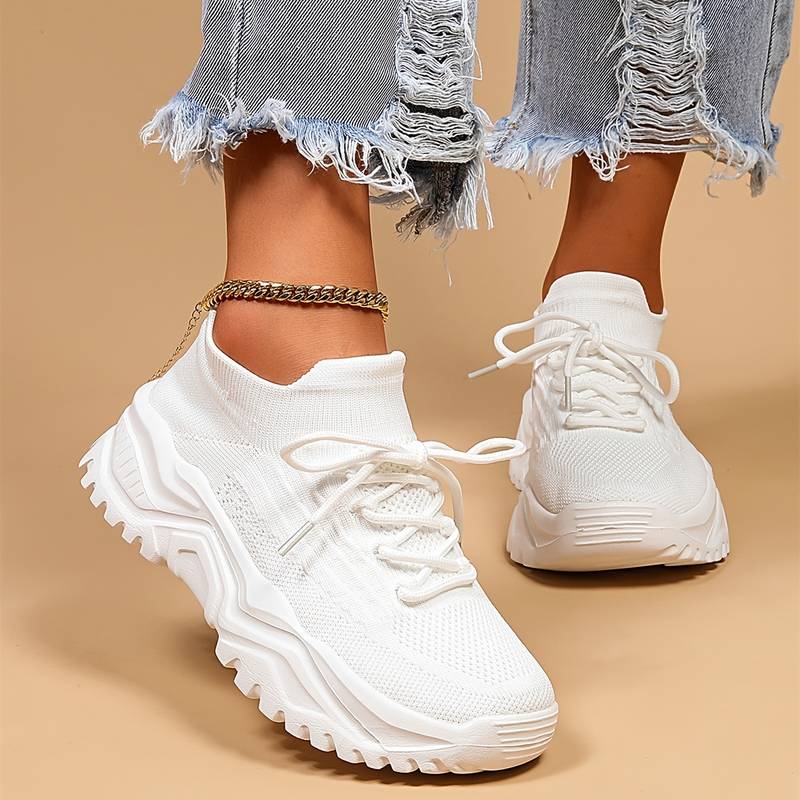 Women's orthopedic knit sneakers with lace-up front and ridged sole
