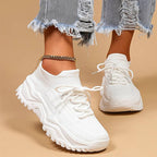 Women's orthopedic knit sneakers with lace-up front and ridged sole