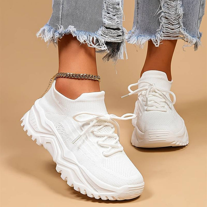 Women's orthopedic knit sneakers with lace-up front and ridged sole