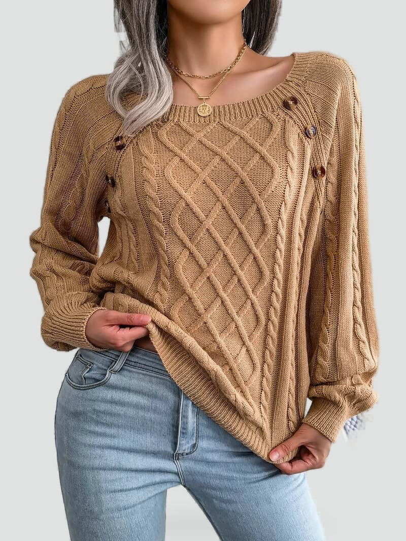 Women's cable knit sweater with diamond pattern and shoulder buttons