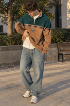 Men's geometric half-zip sweatshirt with stand collar and patterned panels