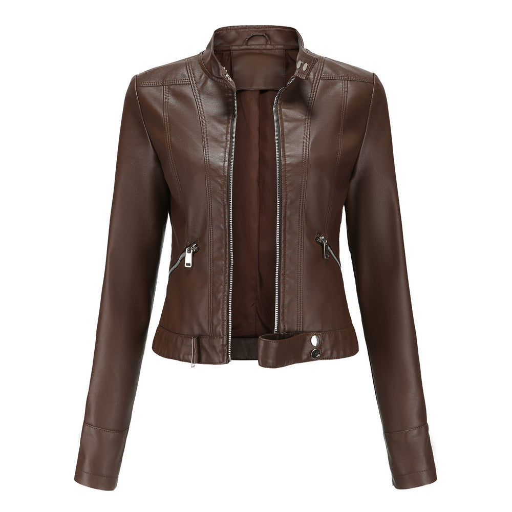 Women's fitted faux leather biker jacket with stand collar, long sleeves and zipped pockets