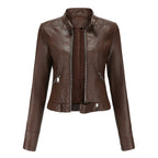 Women's fitted faux leather biker jacket with stand collar, long sleeves and zipped pockets