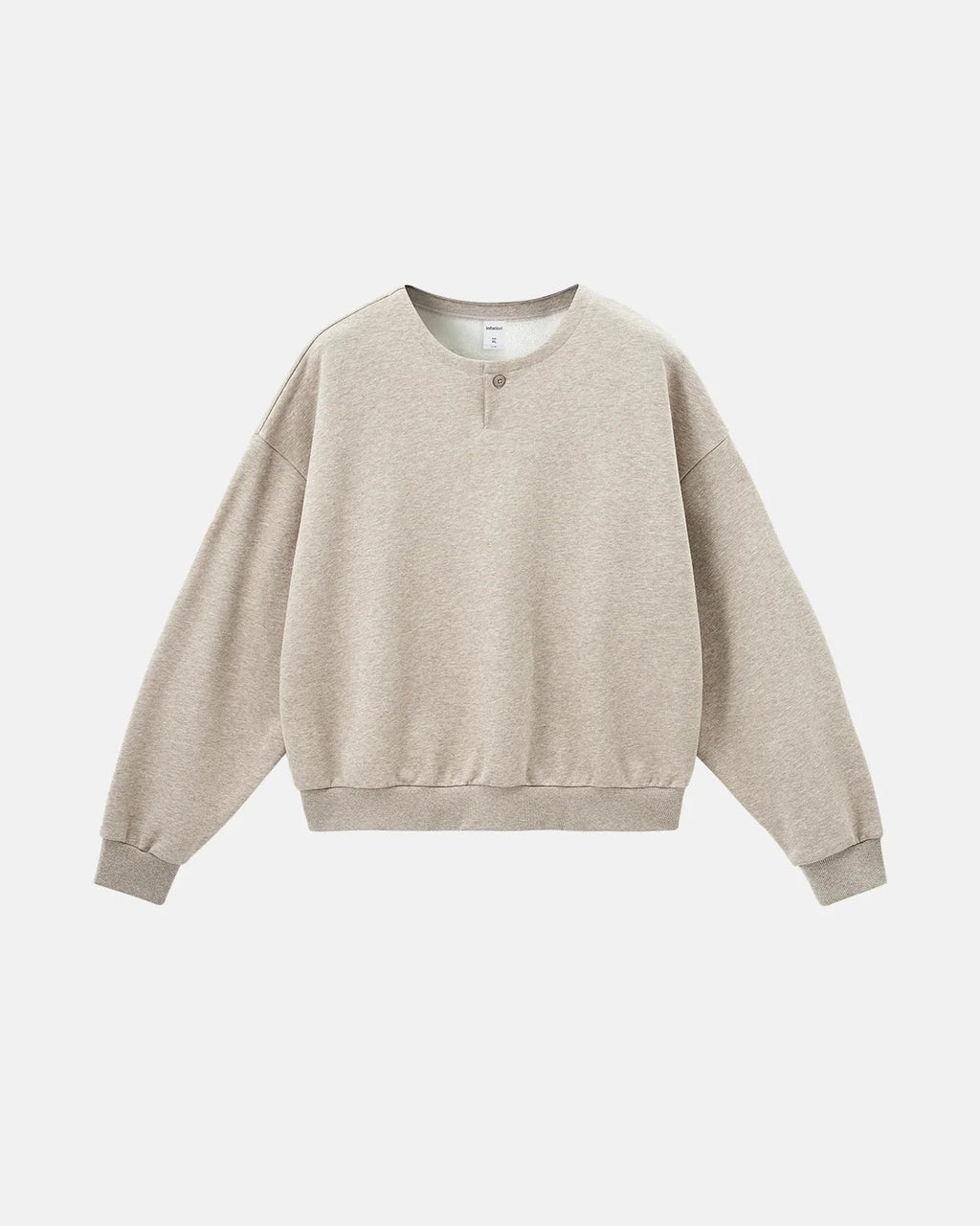 Boxy long sleeve Henley collar sweatshirt with ribbed cuffs and hem