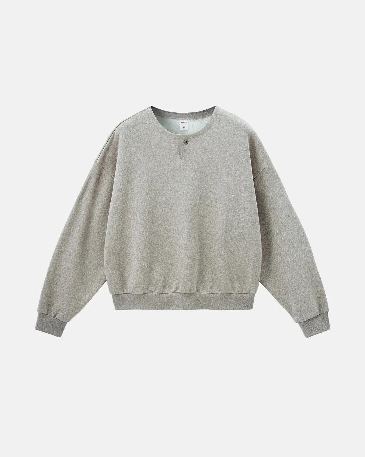 Boxy long sleeve Henley collar sweatshirt with ribbed cuffs and hem