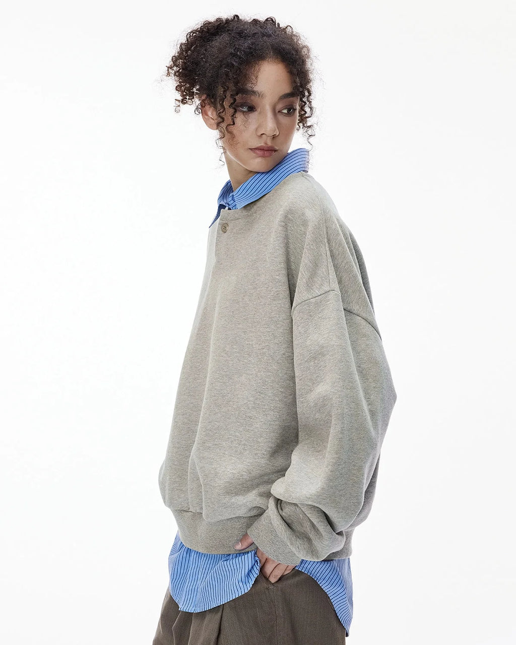 Boxy long sleeve Henley collar sweatshirt with ribbed cuffs and hem