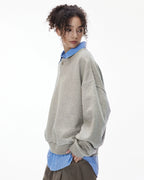 Boxy long sleeve Henley collar sweatshirt with ribbed cuffs and hem