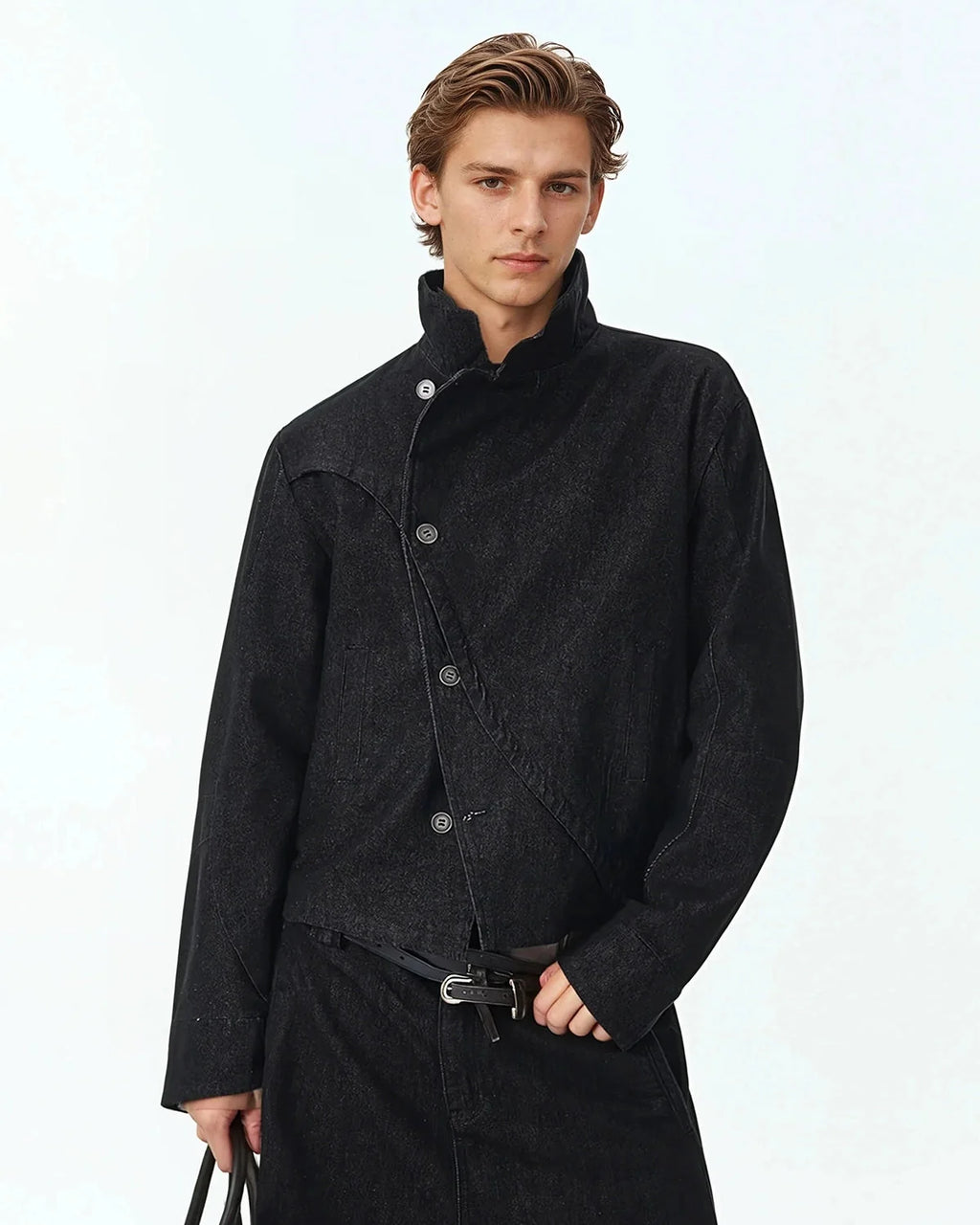 Men's black cropped denim jacket with high collar and asymmetric button front