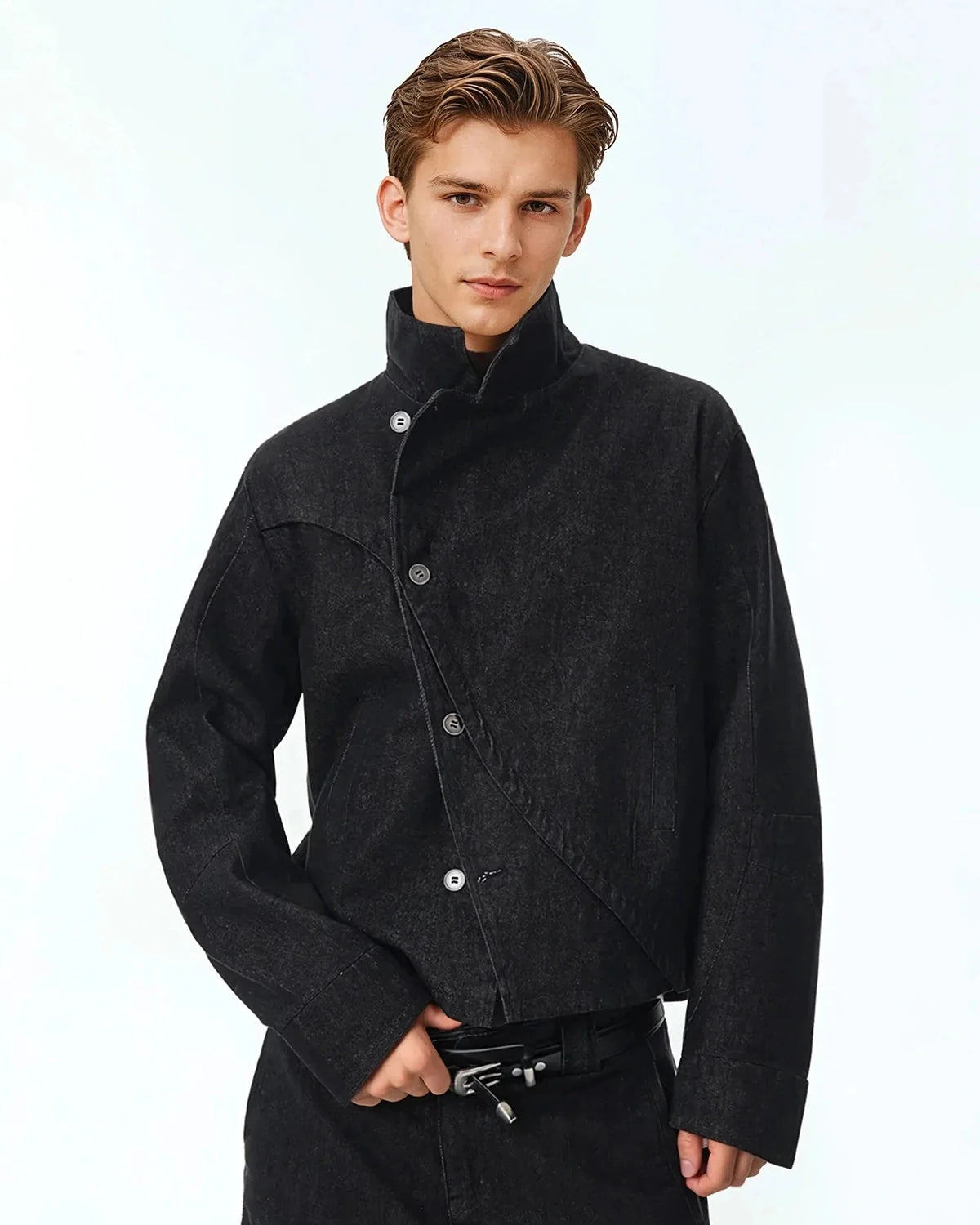 Men's black cropped denim jacket with high collar and asymmetric button front