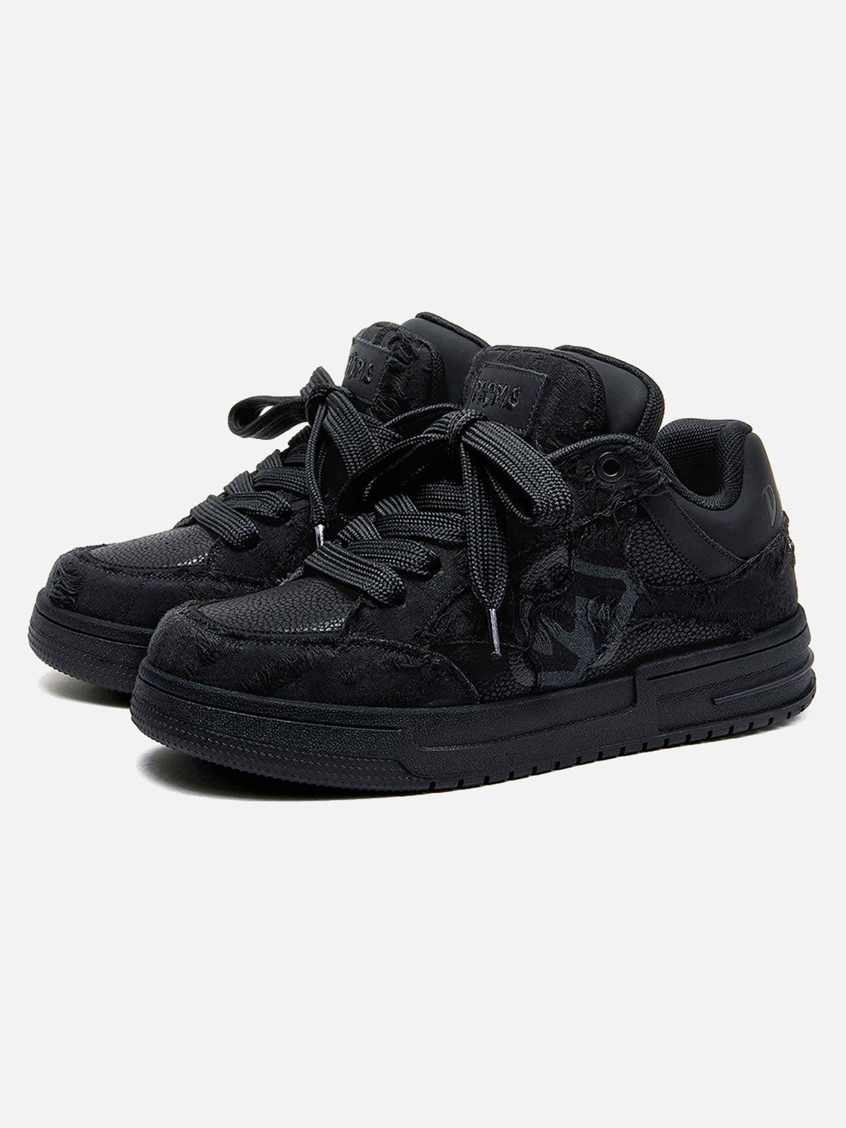 Black high-top skate trainers with textured panels and lace-up fastening