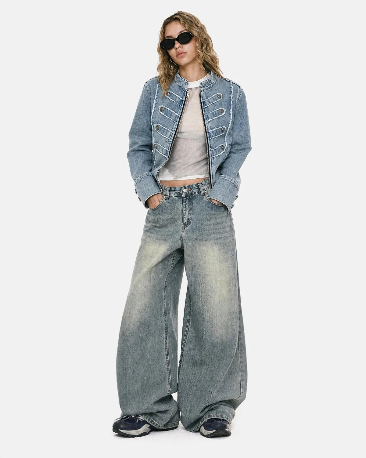 Women's cropped denim jacket with mandarin collar and decorative button tabs