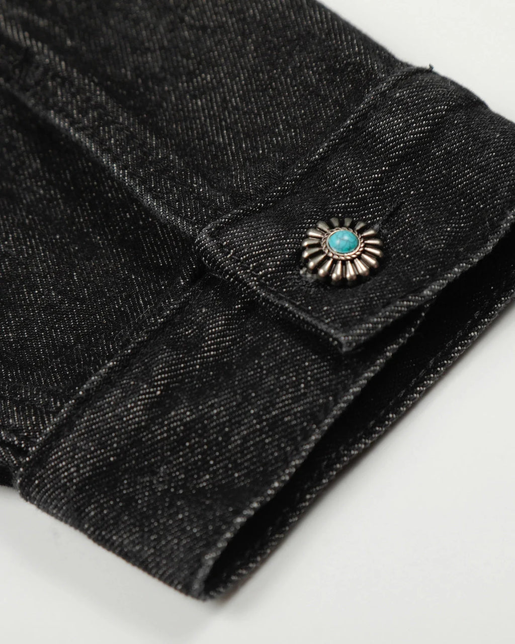 Women's black cropped denim jacket with clasp fastenings and long sleeves