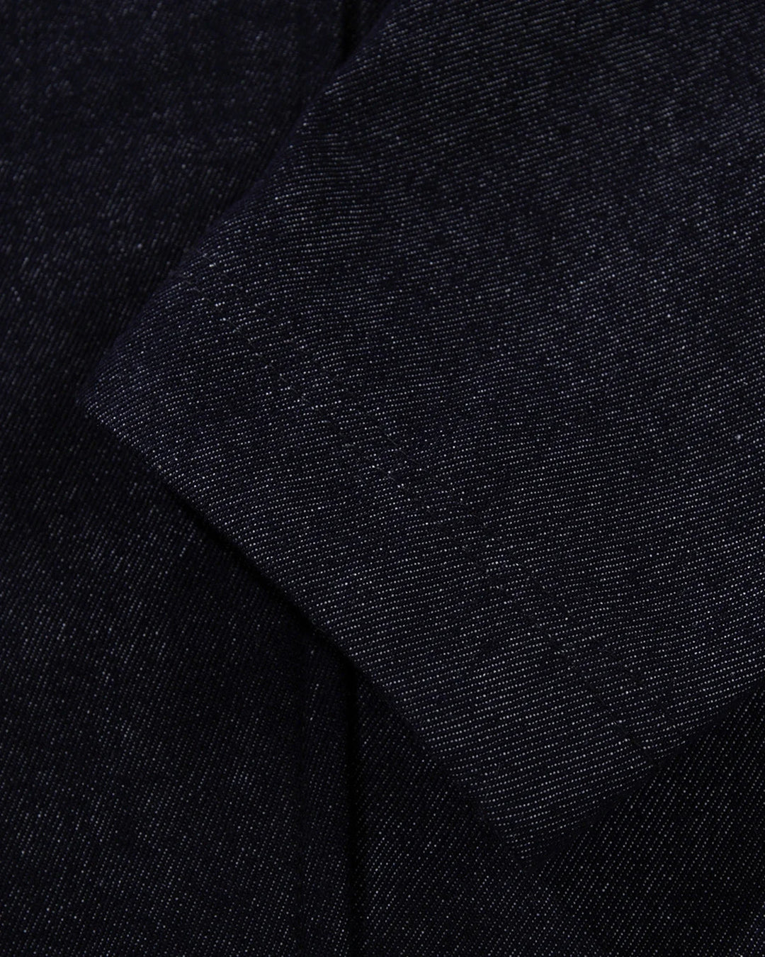 Men's dark blue denim jacket with spread collar and fireman clasp fastenings
