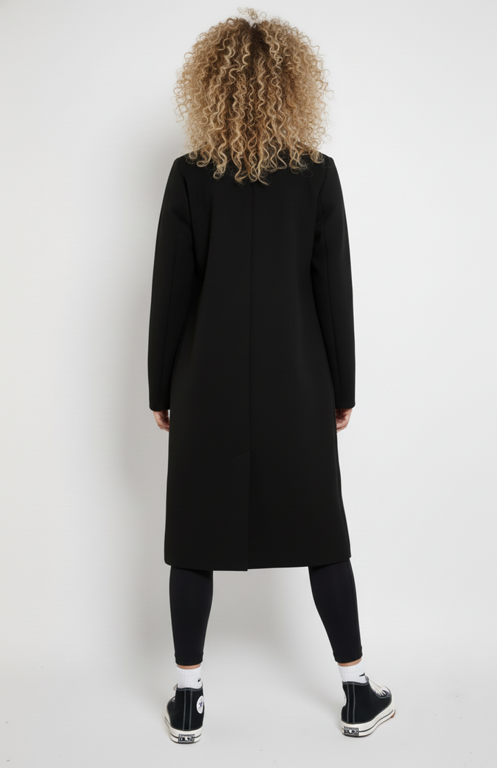 Women's long double-breasted coat with notched lapels