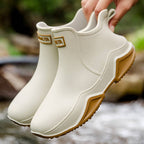 Women's slip-on ankle boot with rounded toe and textured sole