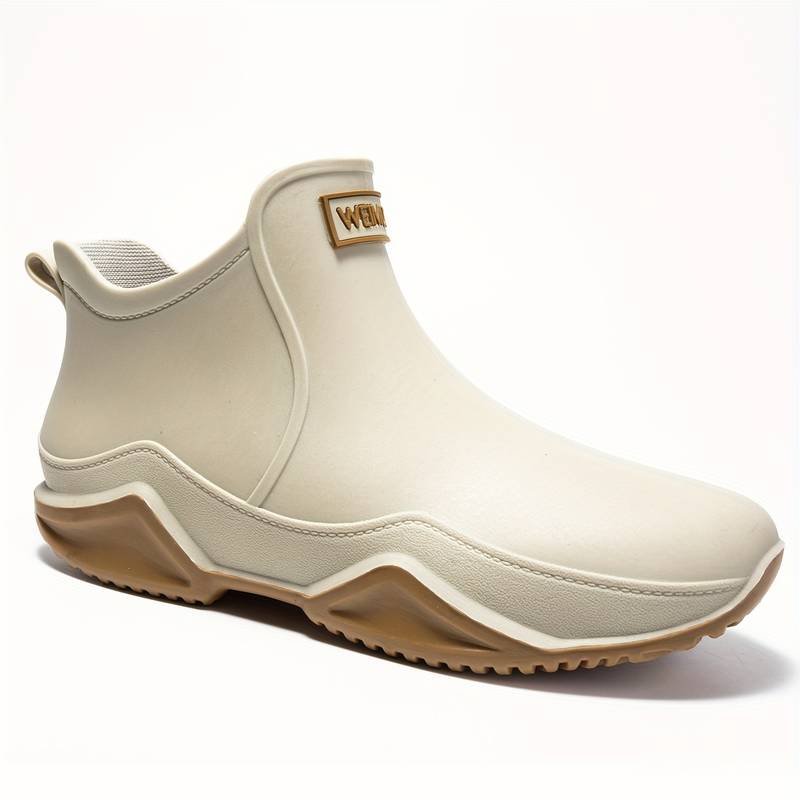 Women's slip-on ankle boot with rounded toe and textured sole