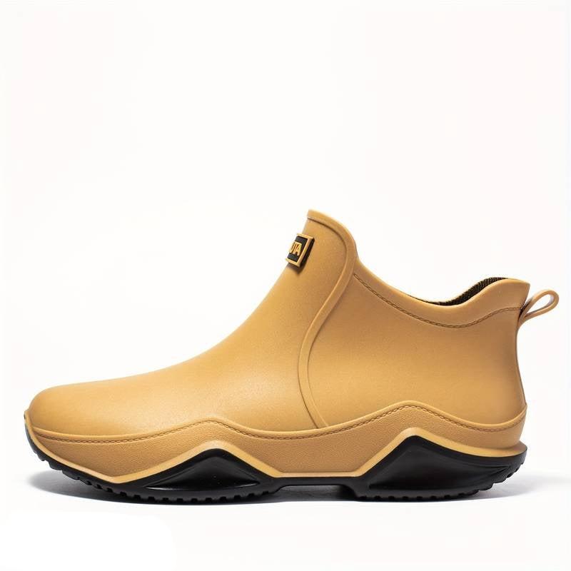 Women's slip-on ankle boot with rounded toe and textured sole