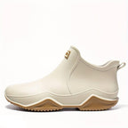 Women's slip-on ankle boot with rounded toe and textured sole
