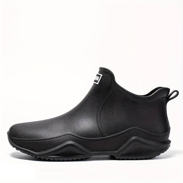 Women's slip-on ankle boot with rounded toe and textured sole