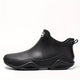 Women's slip-on ankle boot with rounded toe and textured sole