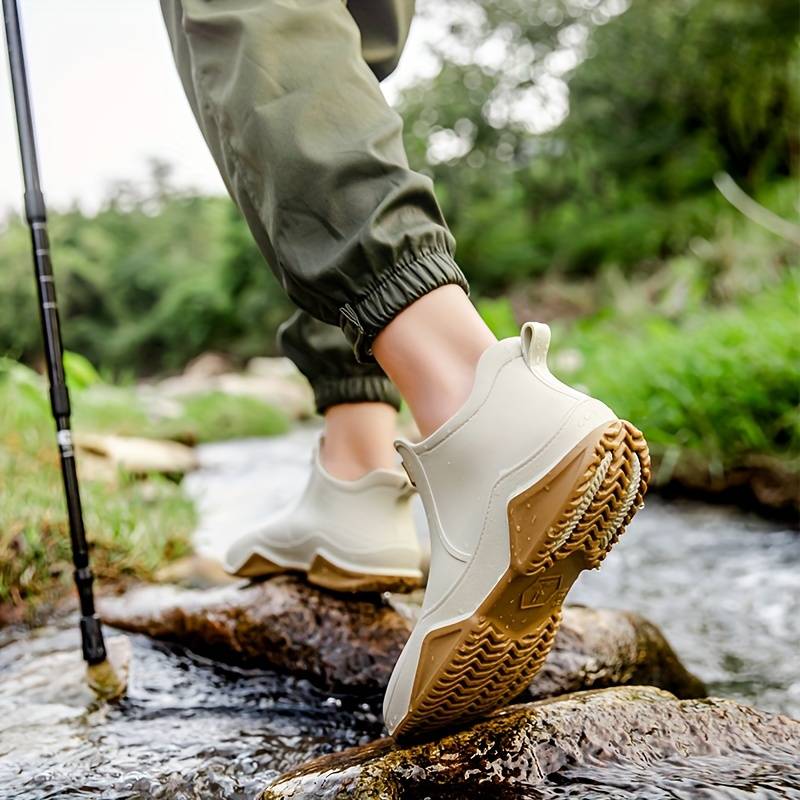 Women's slip-on ankle boot with rounded toe and textured sole
