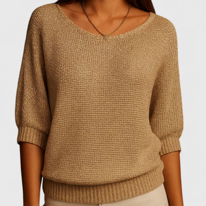 Women's textured knit pullover with round neckline and three-quarter sleeves