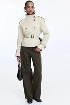 Women's short belted trench coat with stand collar and long sleeves
