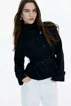 Women's short belted trench coat with stand collar and long sleeves