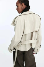 Women's short belted trench coat with stand collar and long sleeves