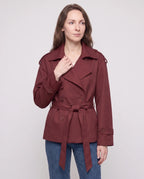 Women's short belted trench jacket with long sleeves and notched collar