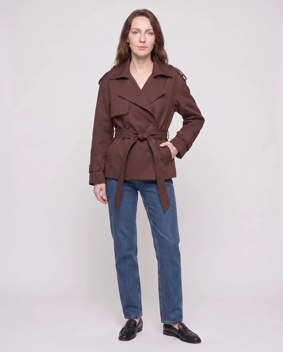 Women's short belted trench jacket with long sleeves and notched collar