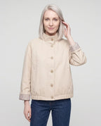 Women's short stand collar jacket with button front and long sleeves