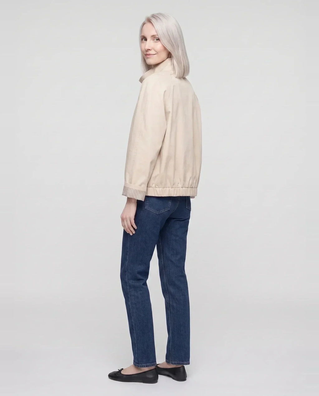 Women's short stand collar jacket with button front and long sleeves