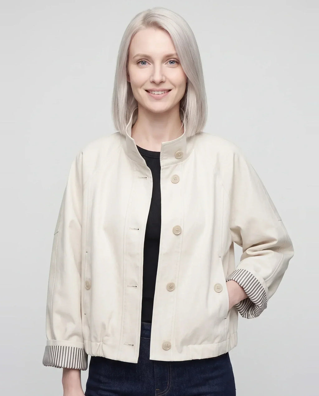 Women's short stand collar jacket with button front and long sleeves