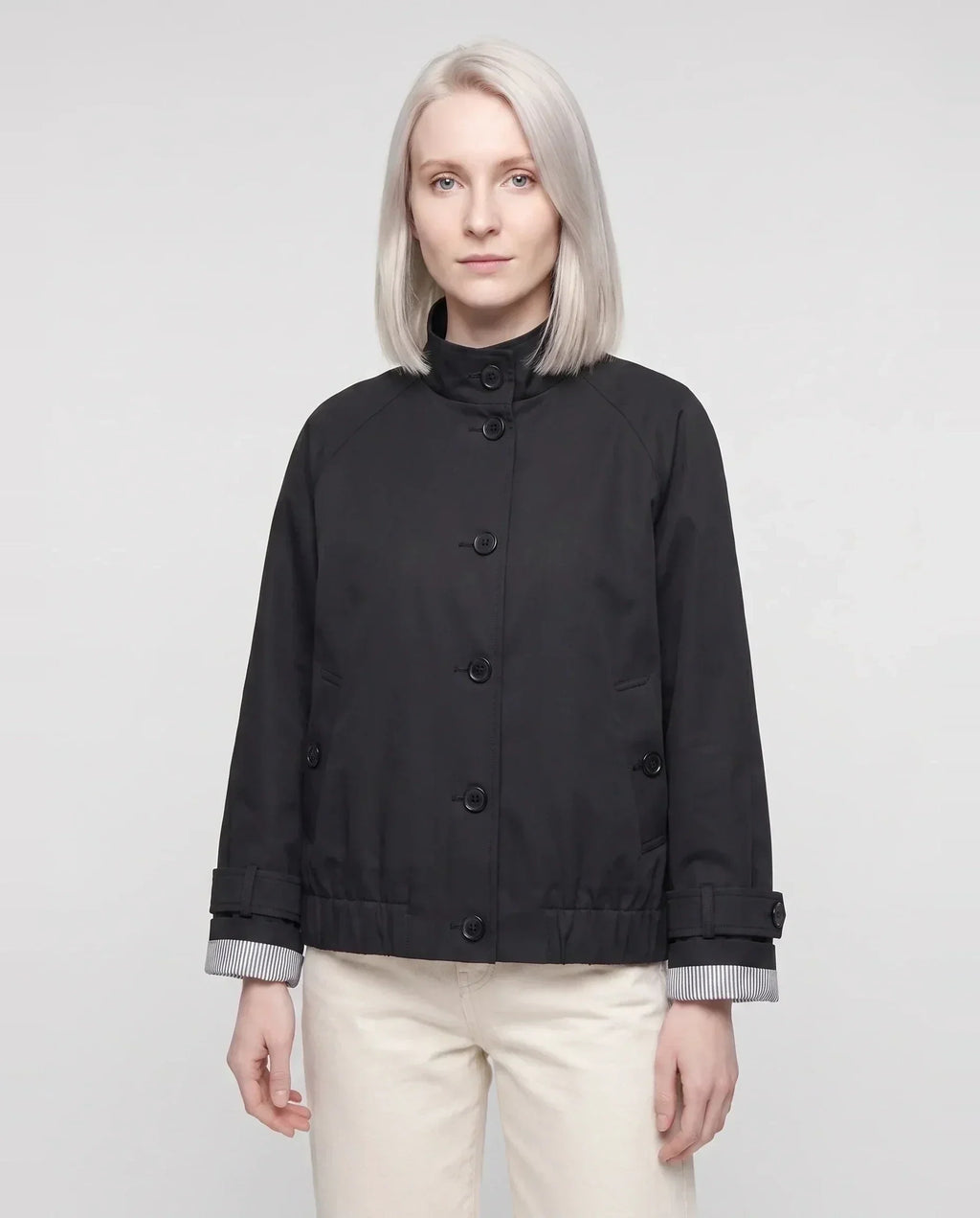 Women's short stand collar jacket with button front and long sleeves