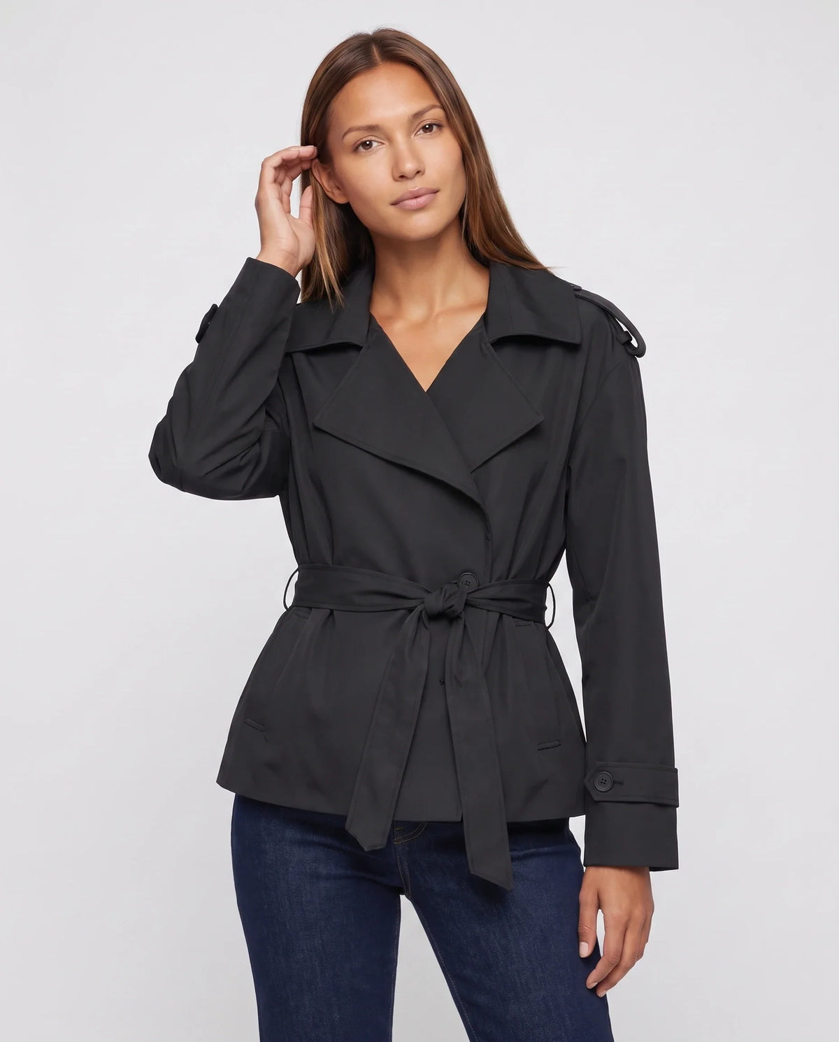 Women's oversized short belted trench jacket with wide lapels and long sleeves