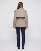 Women's oversized short belted trench jacket with wide lapels and long sleeves