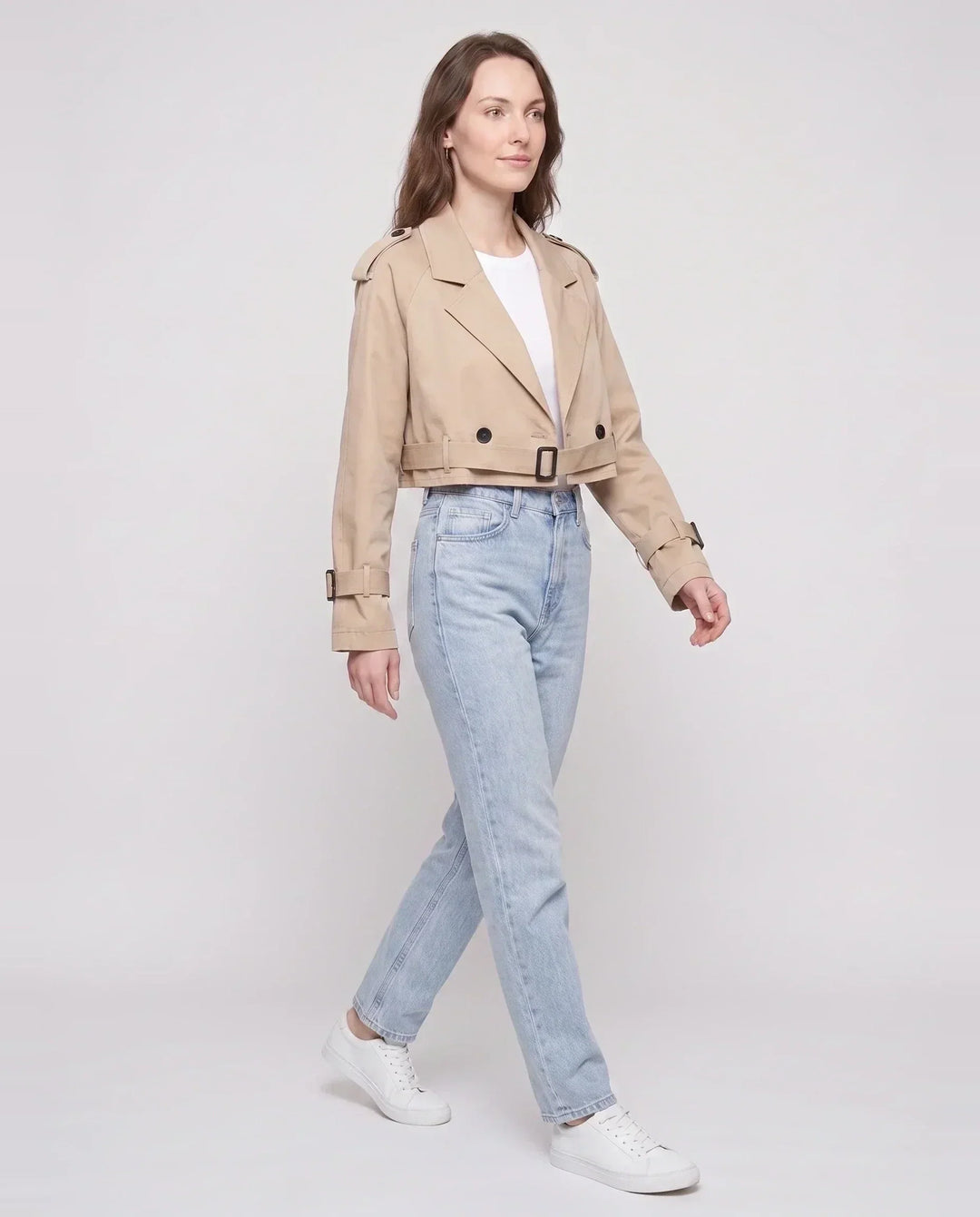 Women's beige cropped trench jacket with belt and buckle cuffs