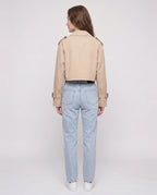 Women's beige cropped trench jacket with belt and buckle cuffs