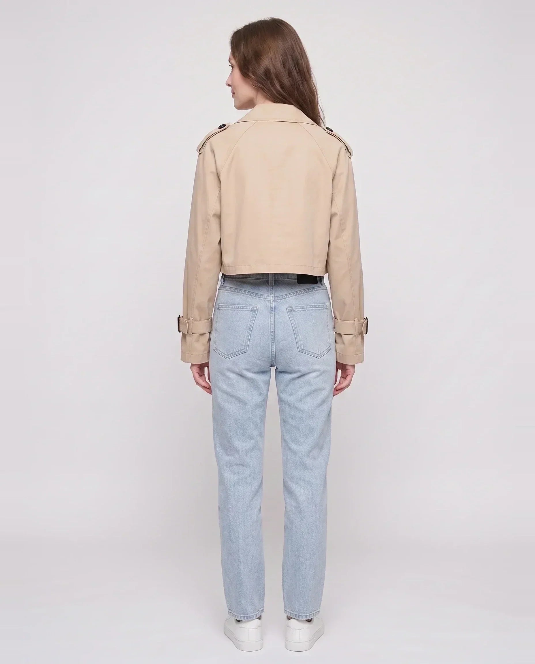 Women's beige cropped trench jacket with belt and buckle cuffs